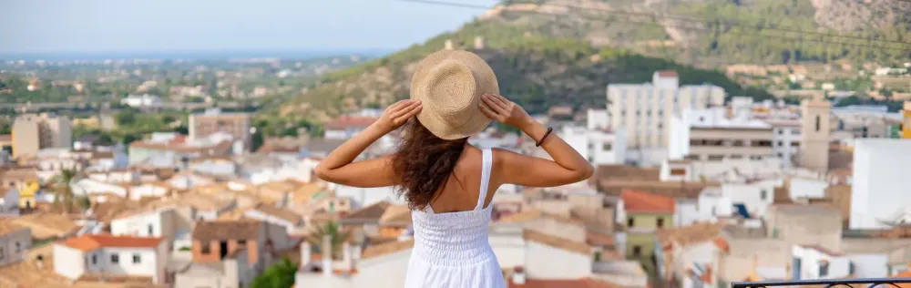 girl wearing hat on vacation.